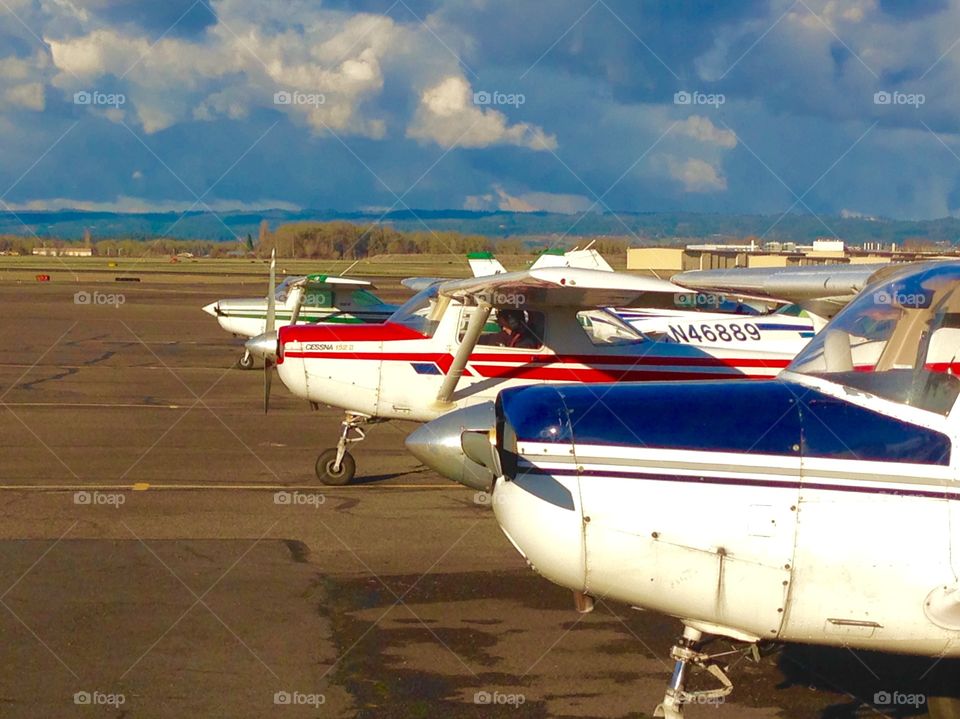 Flight training. Airplanes lined up at a regional flight training school in Oregon.