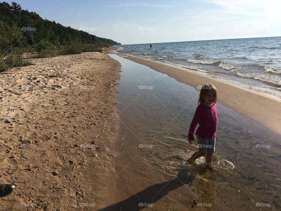 Walking down the beach Lake Michigan 