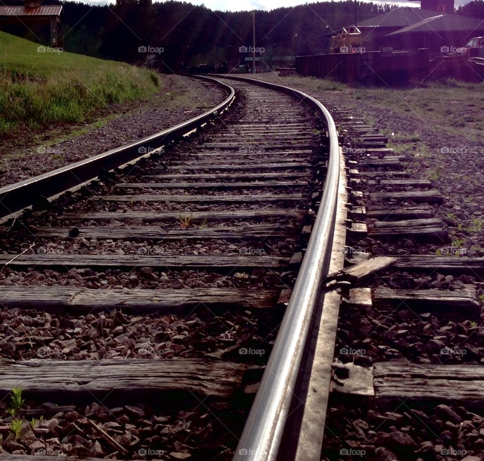 Round the bend. RR tracks easing out of sight