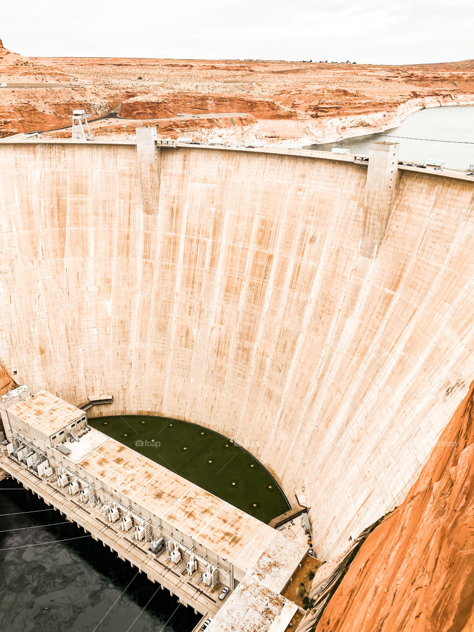 Arizona Lake Powell dam is a site to see. Such a beautiful and breathtaking experience. Being so high up on a bridge looking down at the dam is surreal. 