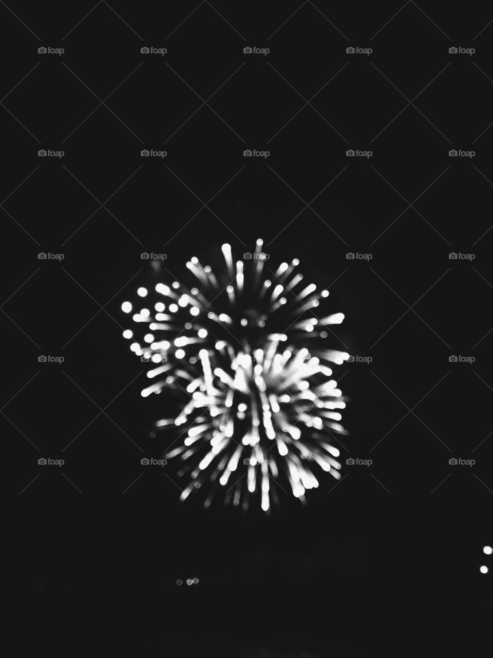 black and white blurry firework background