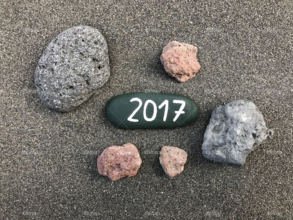 2017 year on black volcanic sand 