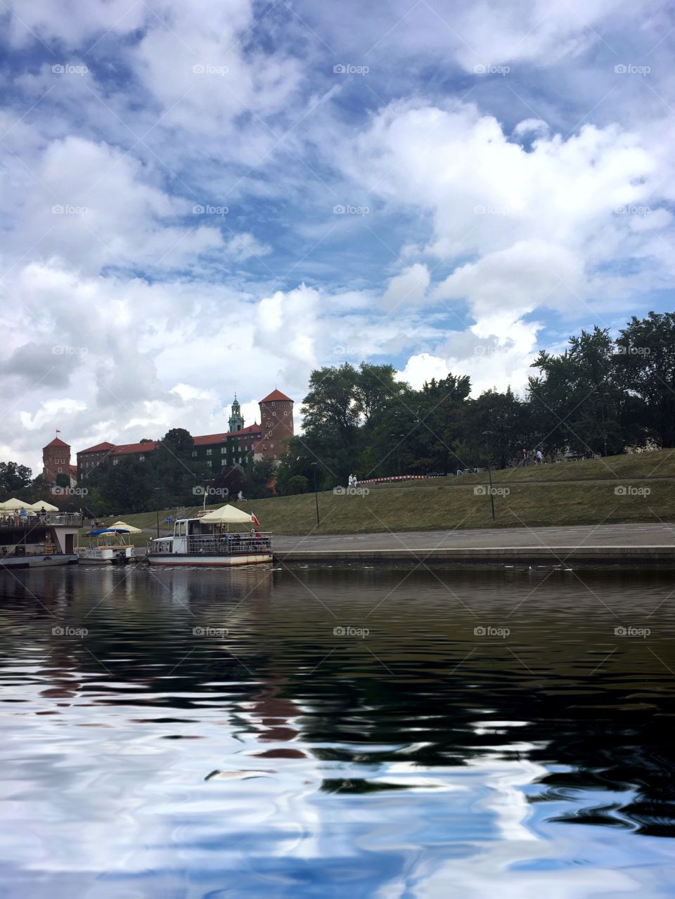 On the water enjoying a summers day.   Passing historical building and wondering who else in time has felt this way. 