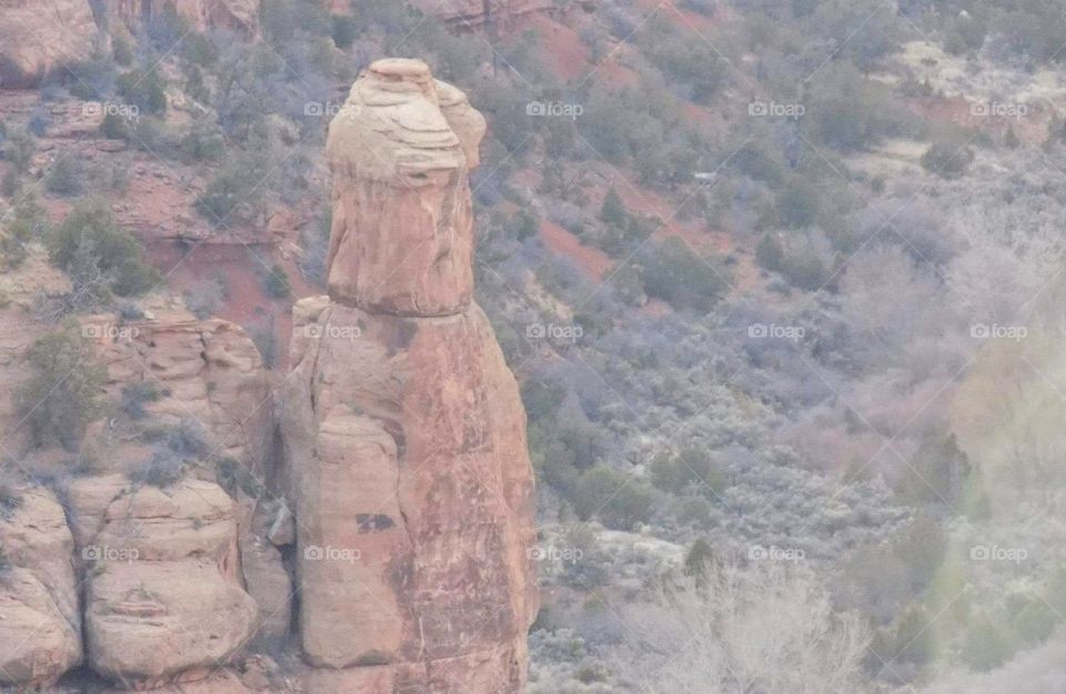 Incredible rock formation. almost looks like a sad man