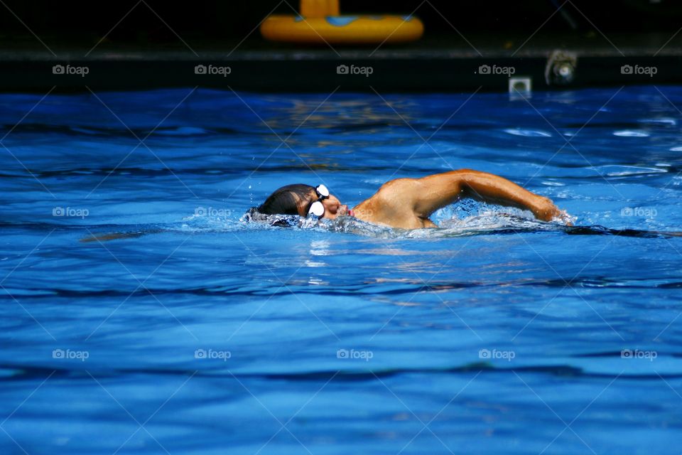 a swimmer in a swimming pool