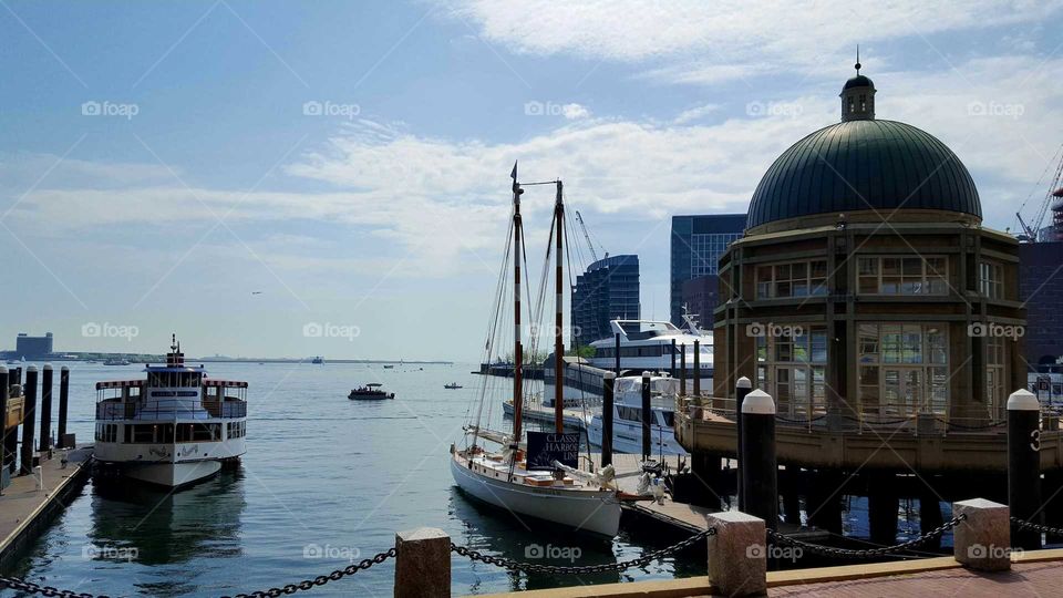 Sailing vessels at the ready in the harbor.