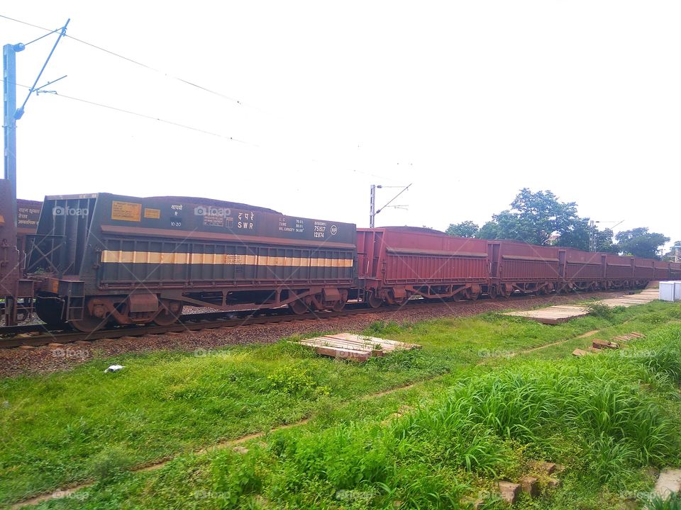 Indian railway heavy loaded goods train