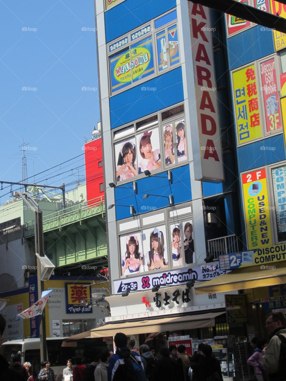 Akihabara, Tokyo, Japan. Billboards for Maid and Idol Cafes