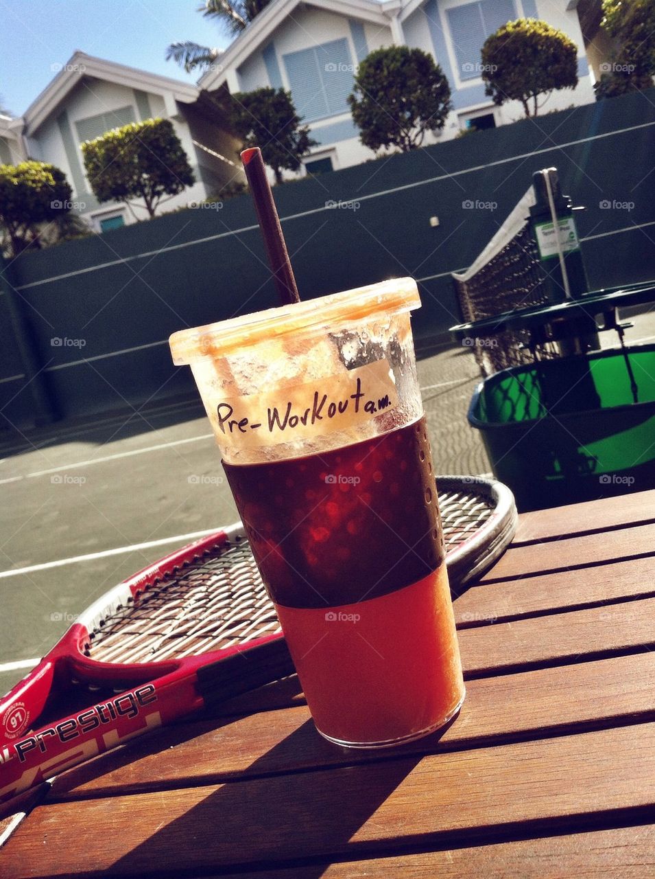 Pre Work Out Shake on a tennis court