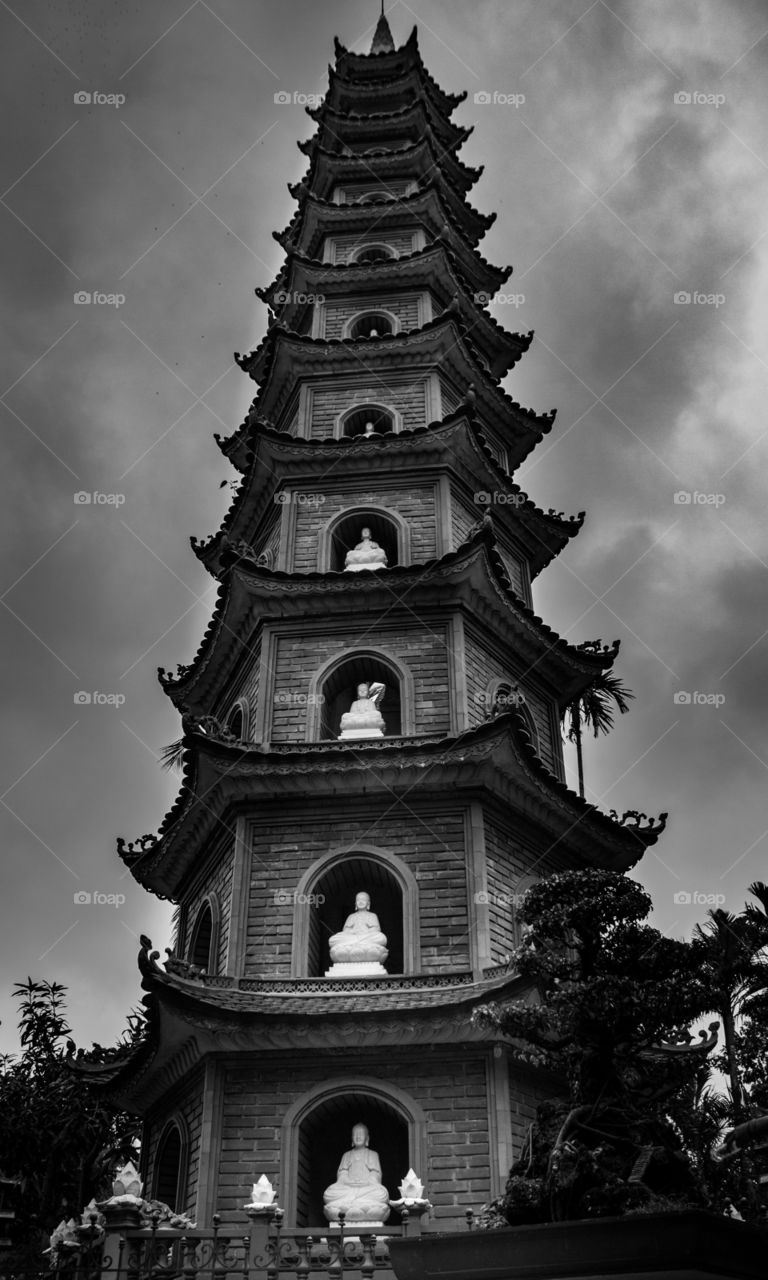 Buddhist tower in Hanoi park, Vietnam.
