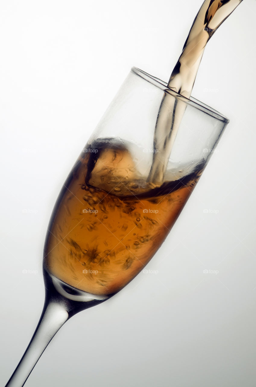 Glass of red wine on White background