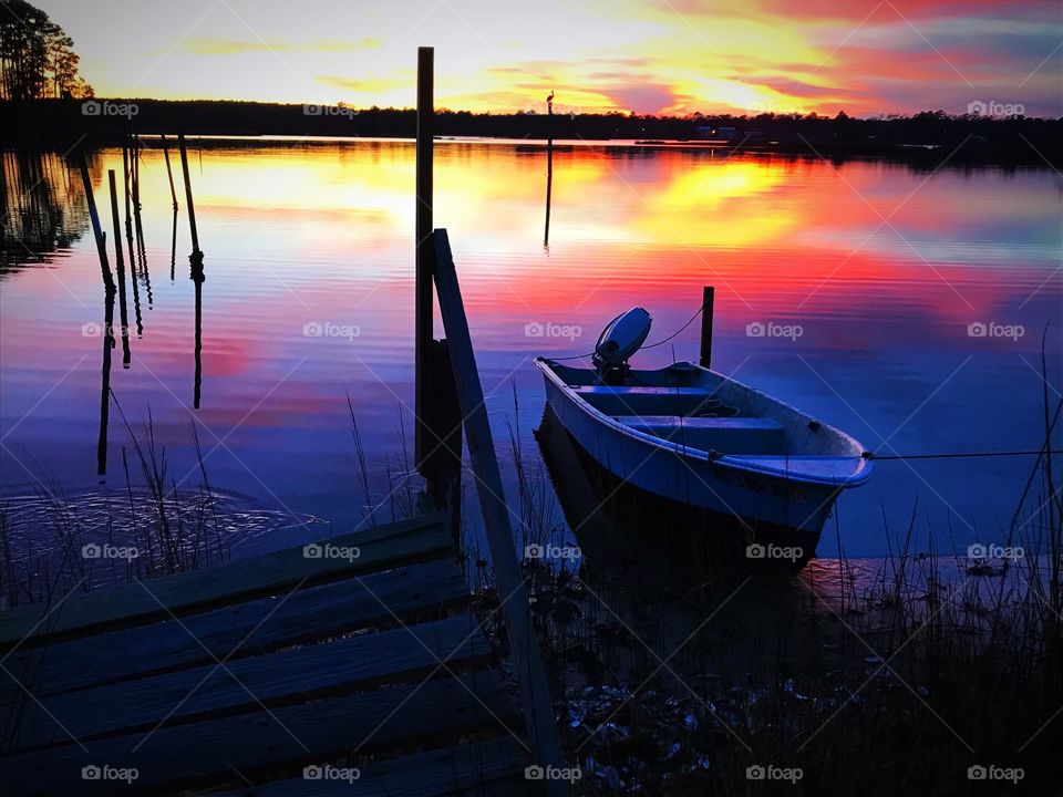 Summer sunsets, old boat and broken dock beauty at it’s finest 