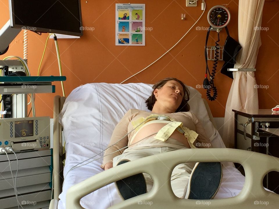 Female patient resting on bed