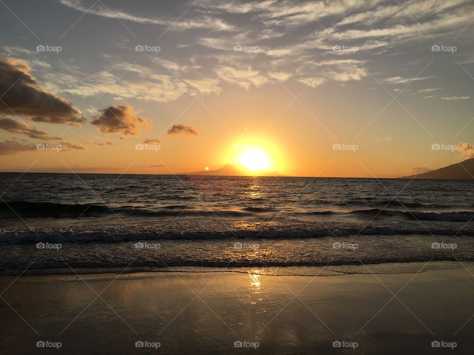 Scenic view of beach during sunset