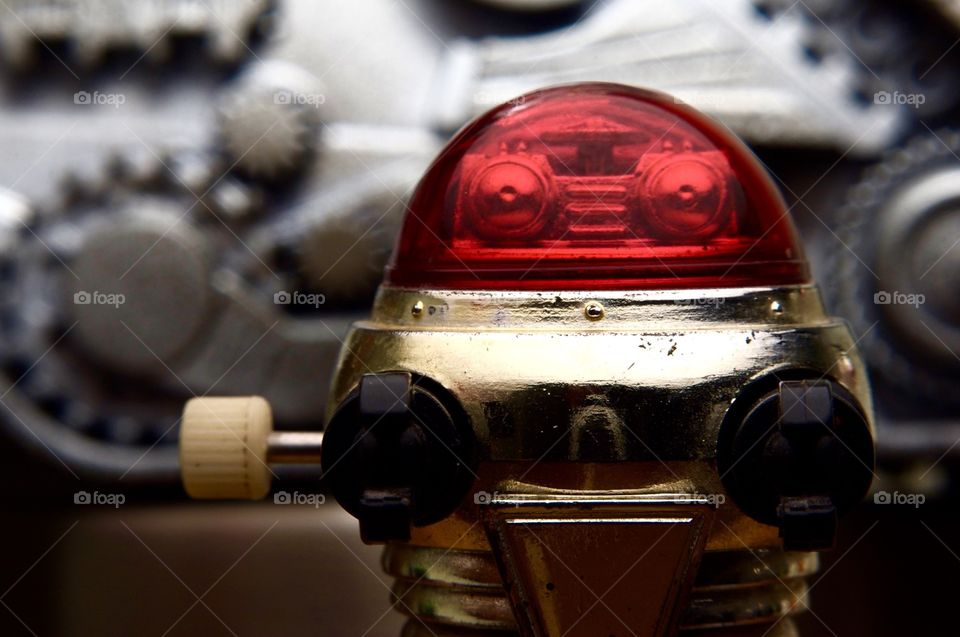 Macro photo of a wind-up toy robot.