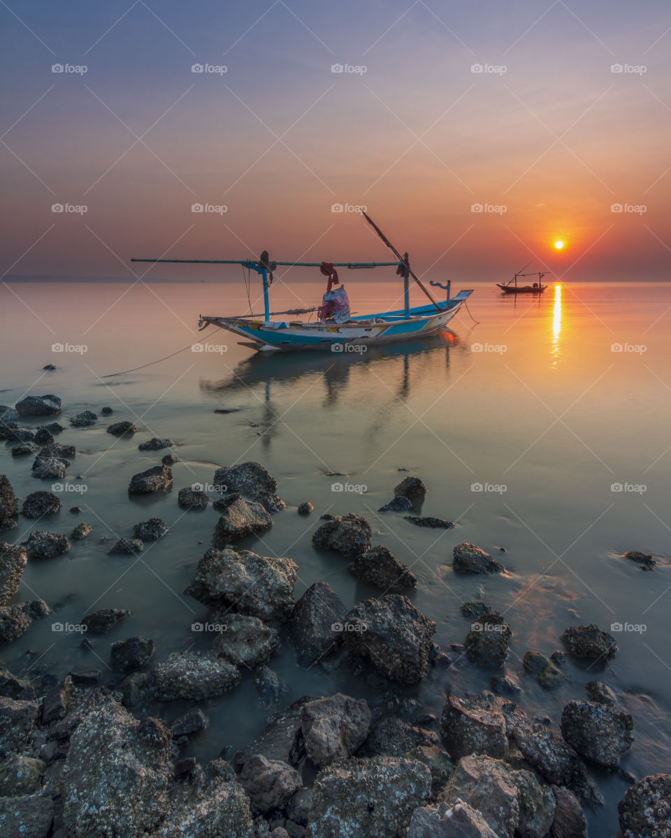 scenic view of kenjeran beach during sunrise