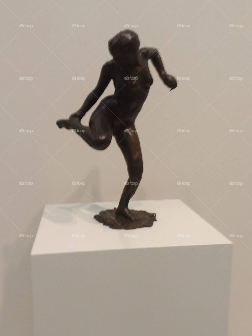 modern museum holding a breakdancing, permanently young man