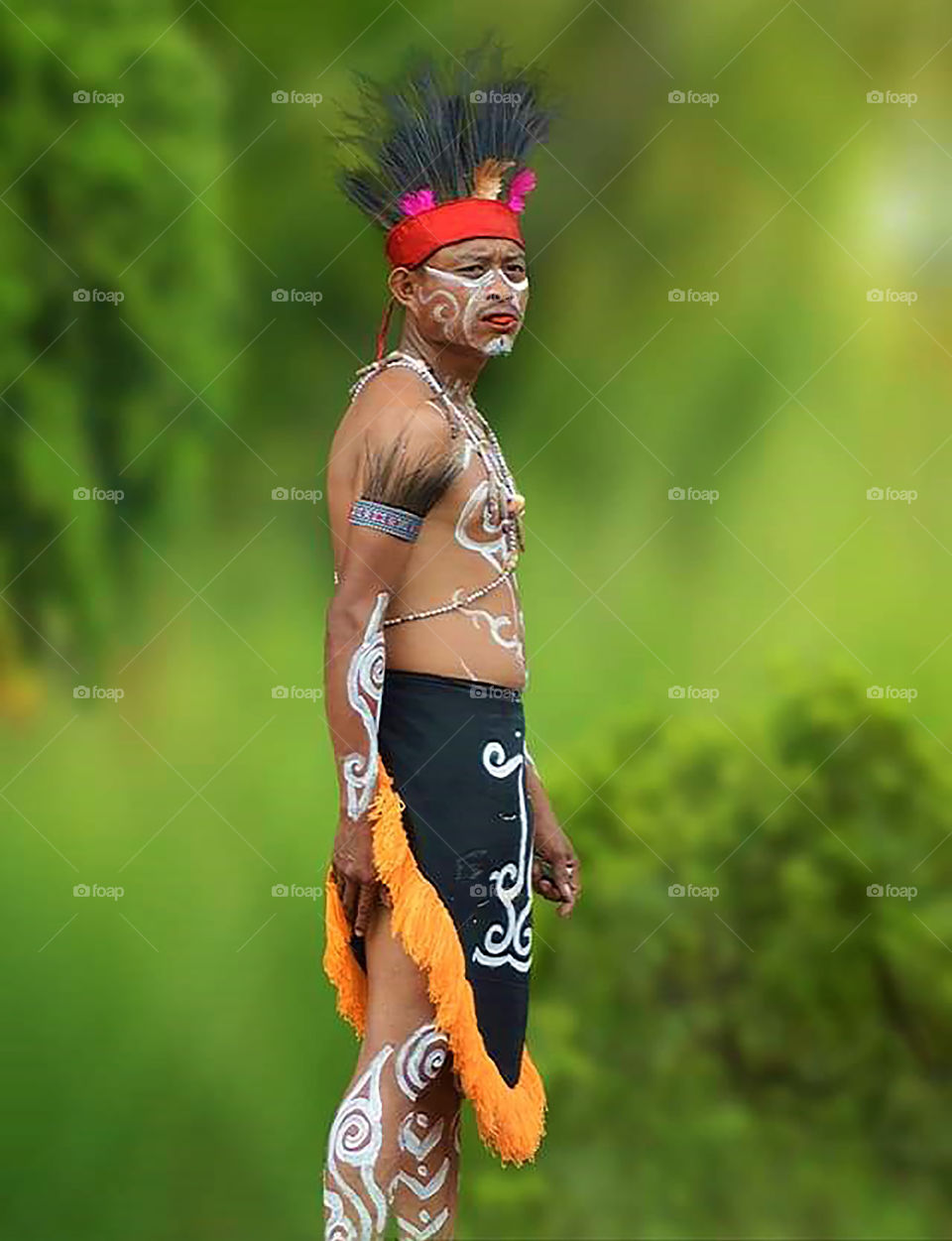 Papuan men in full clothing
