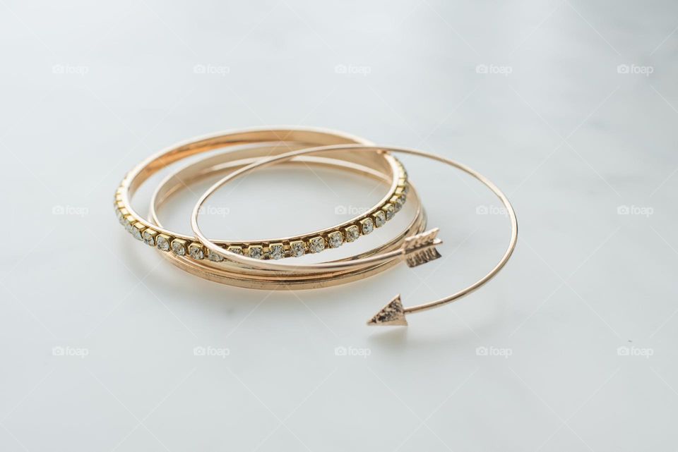 stacked bracelets gold