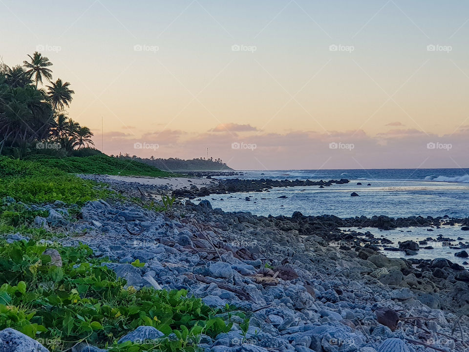 rocky beach during sunset