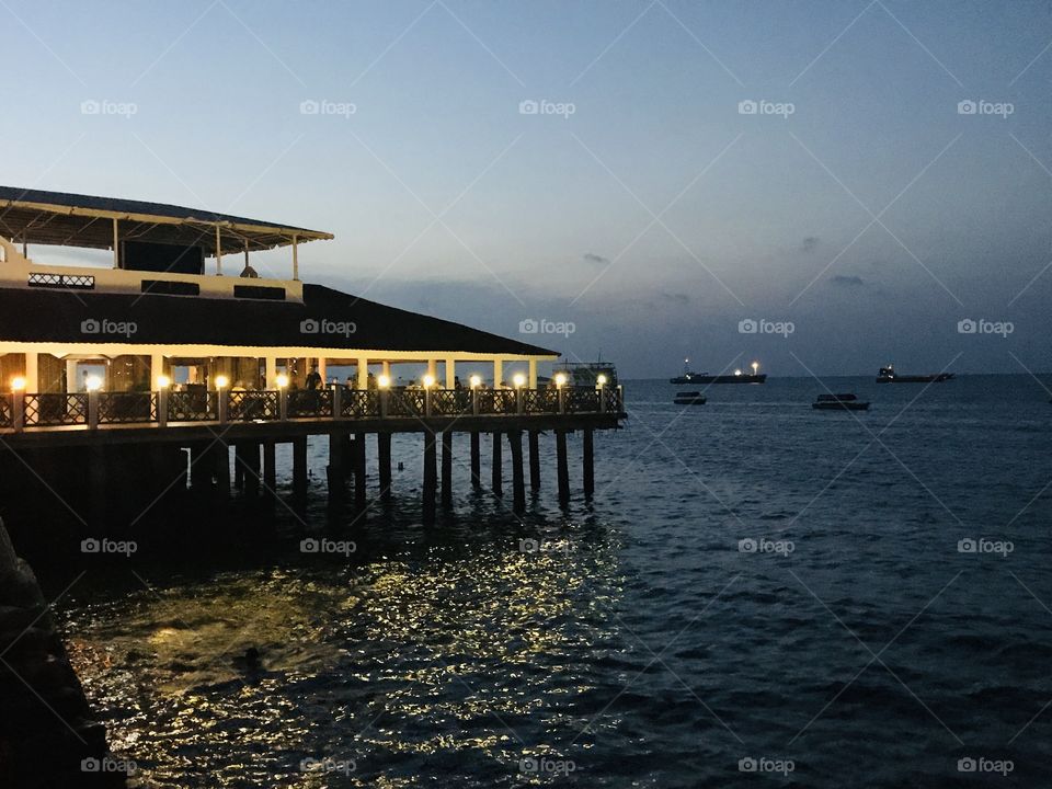Peaceful evening with food, cool breeze and these breathtaking moments. Captured The floating restaurant view in Zanzibar. 