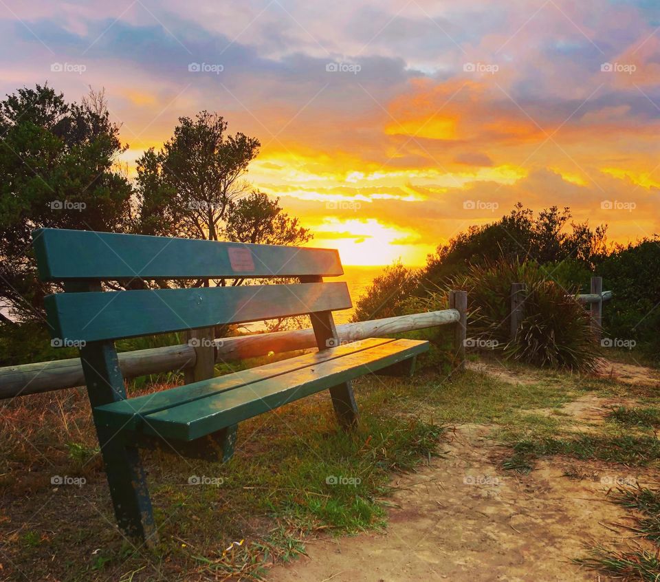 Sunrise at the green bench 