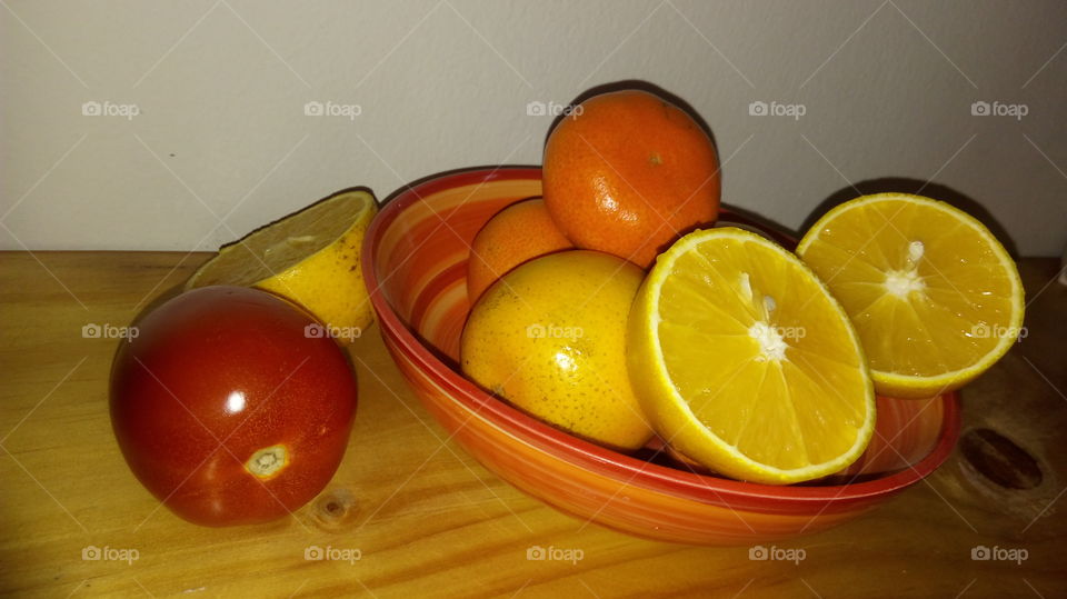 Close-up of citrus fruits in bowl