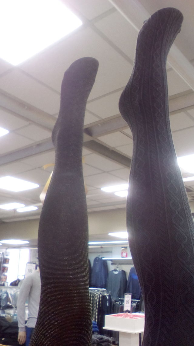 Legs up in modern fashion store