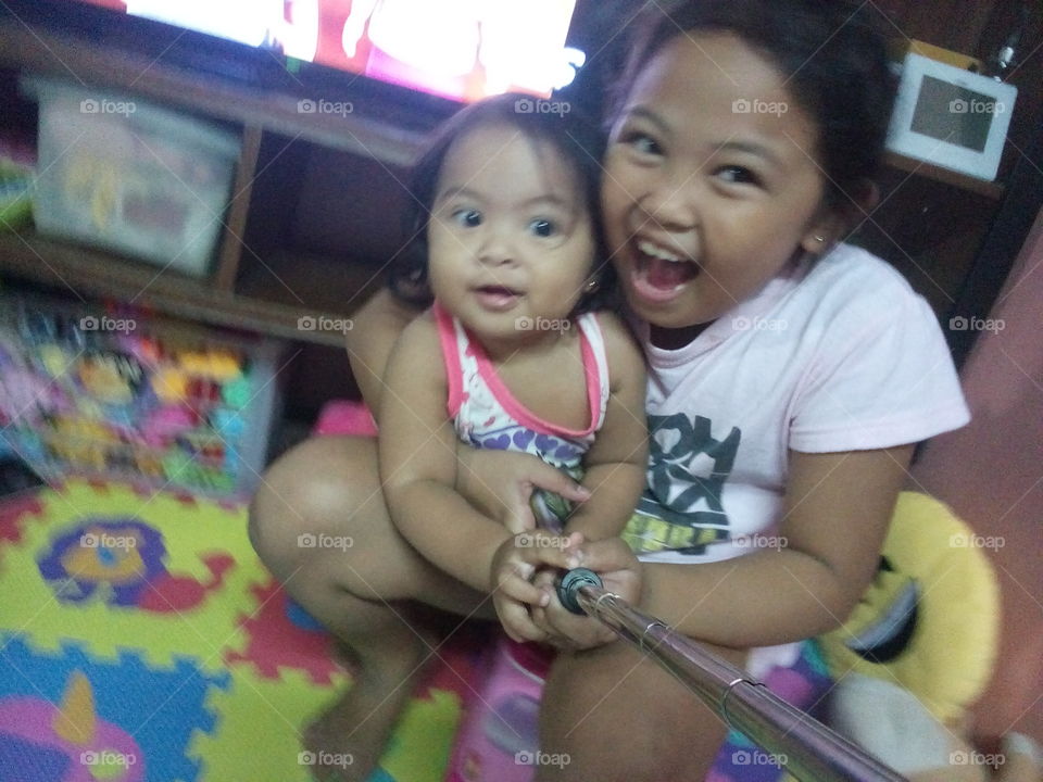 Happiness can be stress relieving especially when you are with your best playmate in the world! Big Sister Baby Sister...