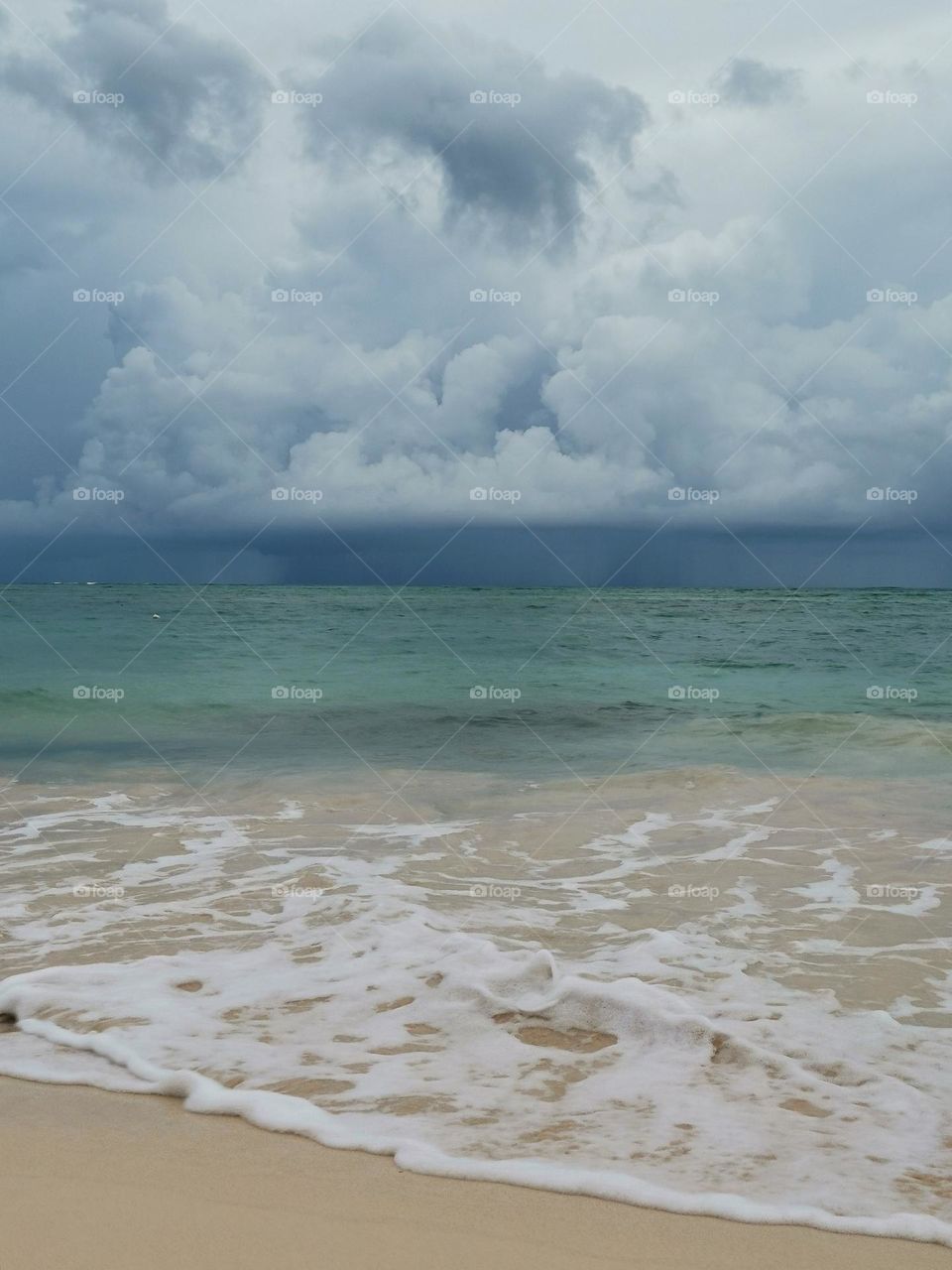 Sea. Seashore. Cloudy weather. Waves. Rain. Seascape.