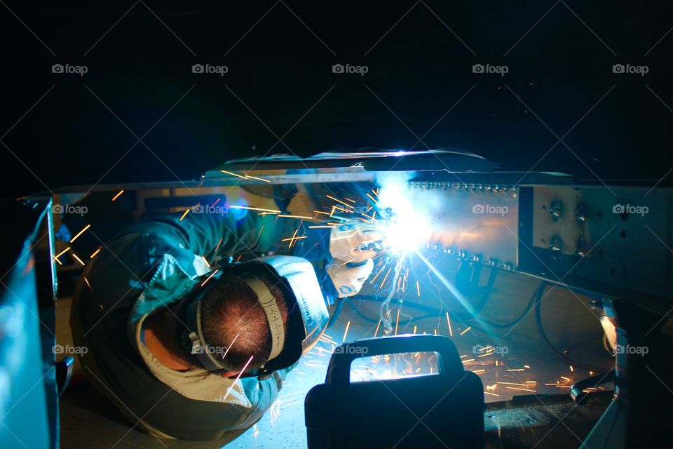 Welding on the truck. 