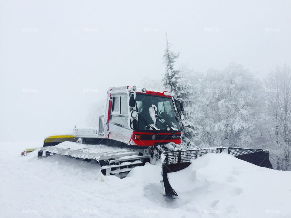 Snow plough truck removing snow 