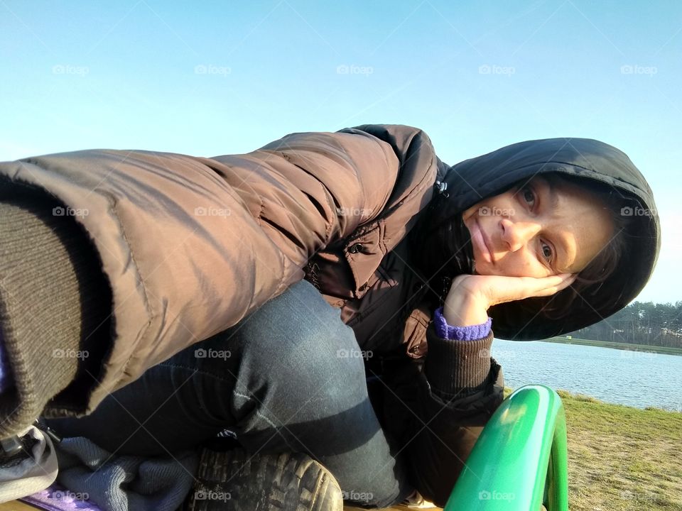 selfie girl on the nature lake shore