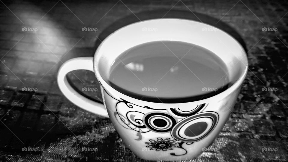 beautiful black and white tea cup on the table