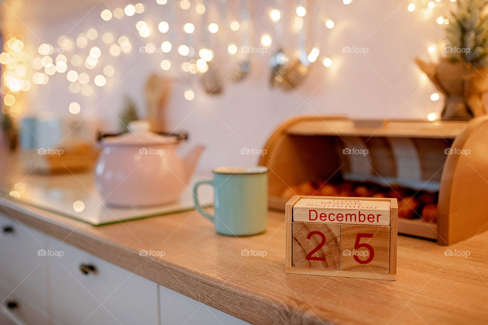 Christmas background with wooden block calendar with the date of December 25