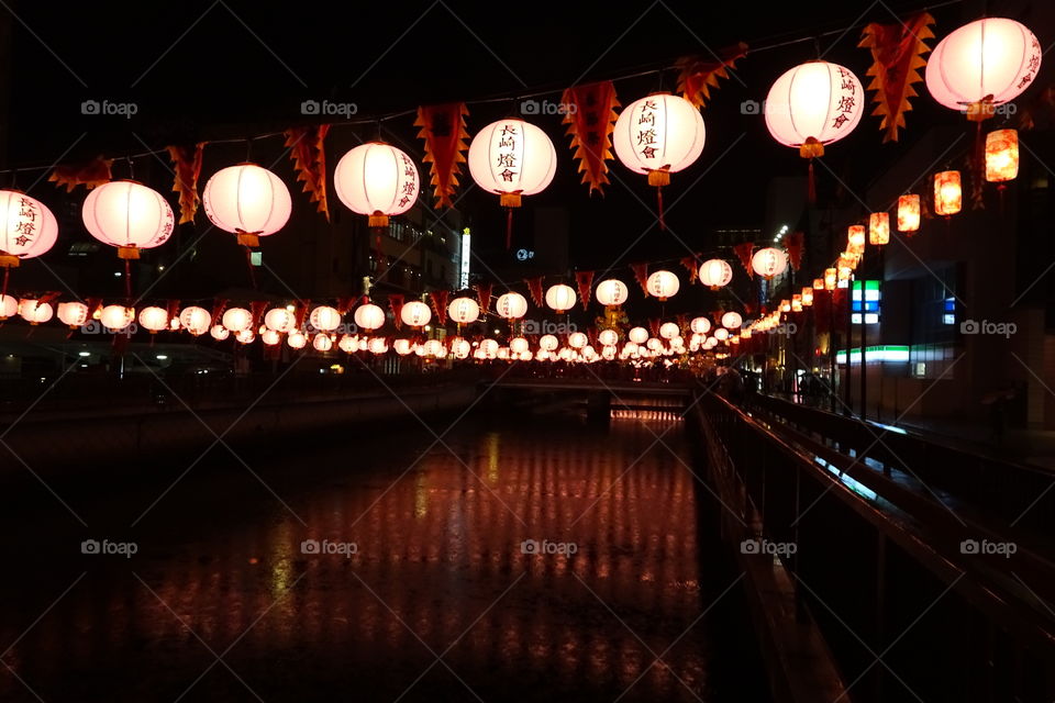 Night scene on the stream running through Chinatown Nagasaki. It's lit up like this Chinese New Year.