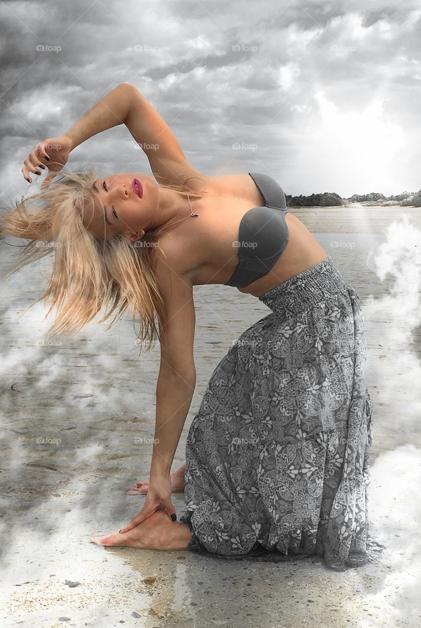 Young woman posing at beach