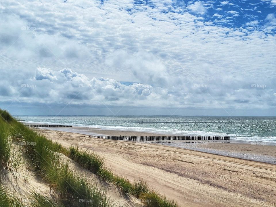 The beach of Burgh Haamstede  is the most beautiful beach in the Netherlands. You have to walk at least half a hour through the amazing dunes to be here.