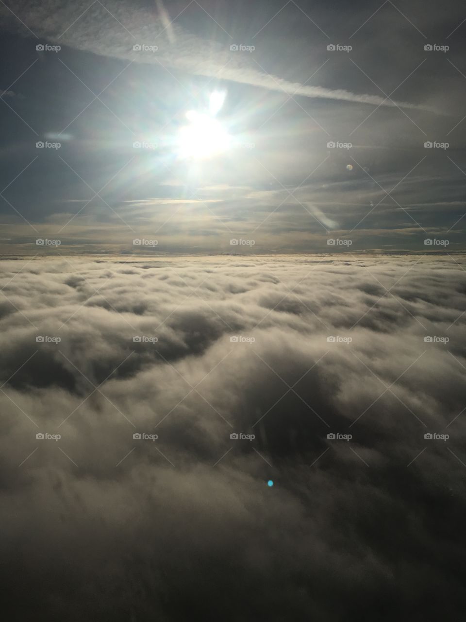 Cloudy sunny sky by aeroplane 