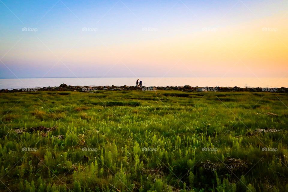 Summer night walking by the seaside 