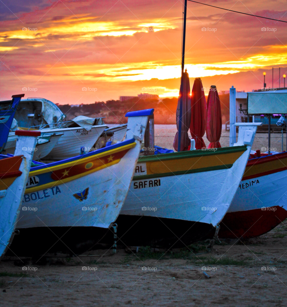 armacao de pera. algarve. portugal beach sunset boats by ponchokid