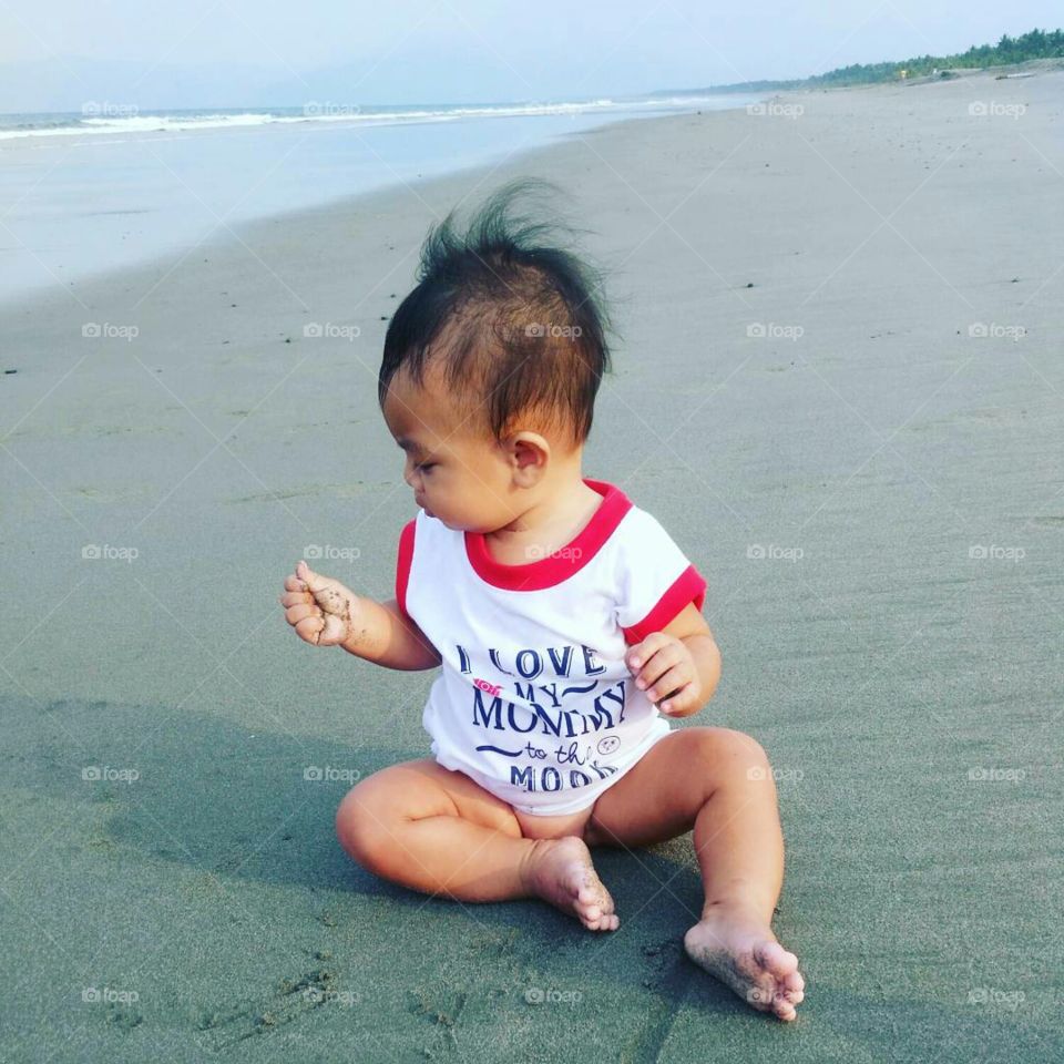 Gabriel's first beach exerience