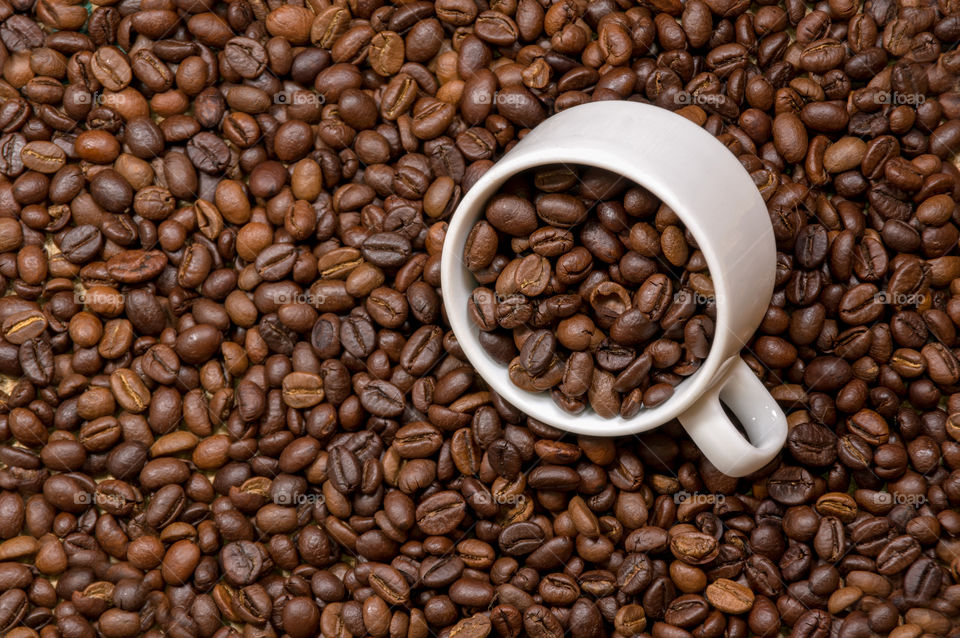 Coffee beans and cup for business ideas