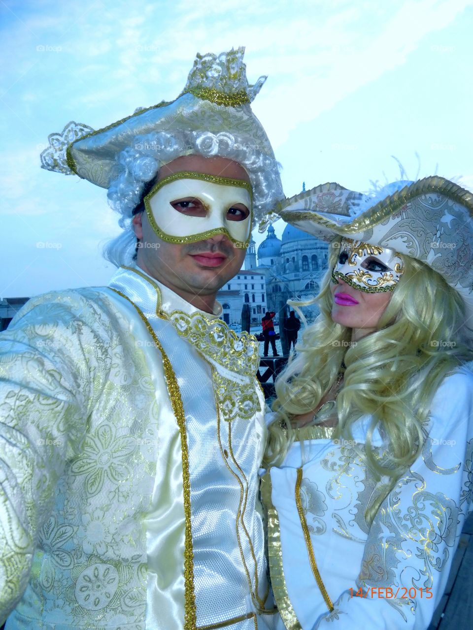 Young couple in carnival costume