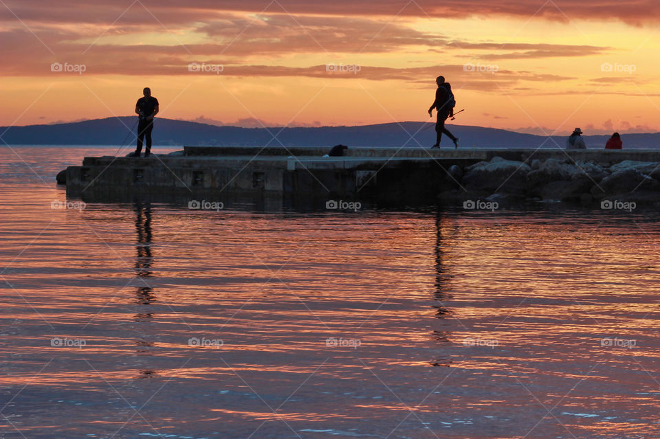 Fishing at sunset