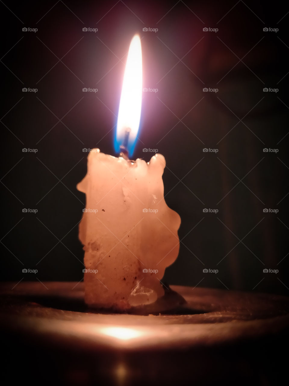 candle giving light to the world .