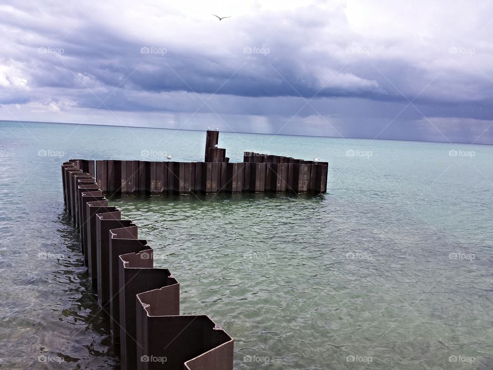 stormy days. I was walking along the beach of Lake michigan and captured this beautiful storm rolling in off the lake.