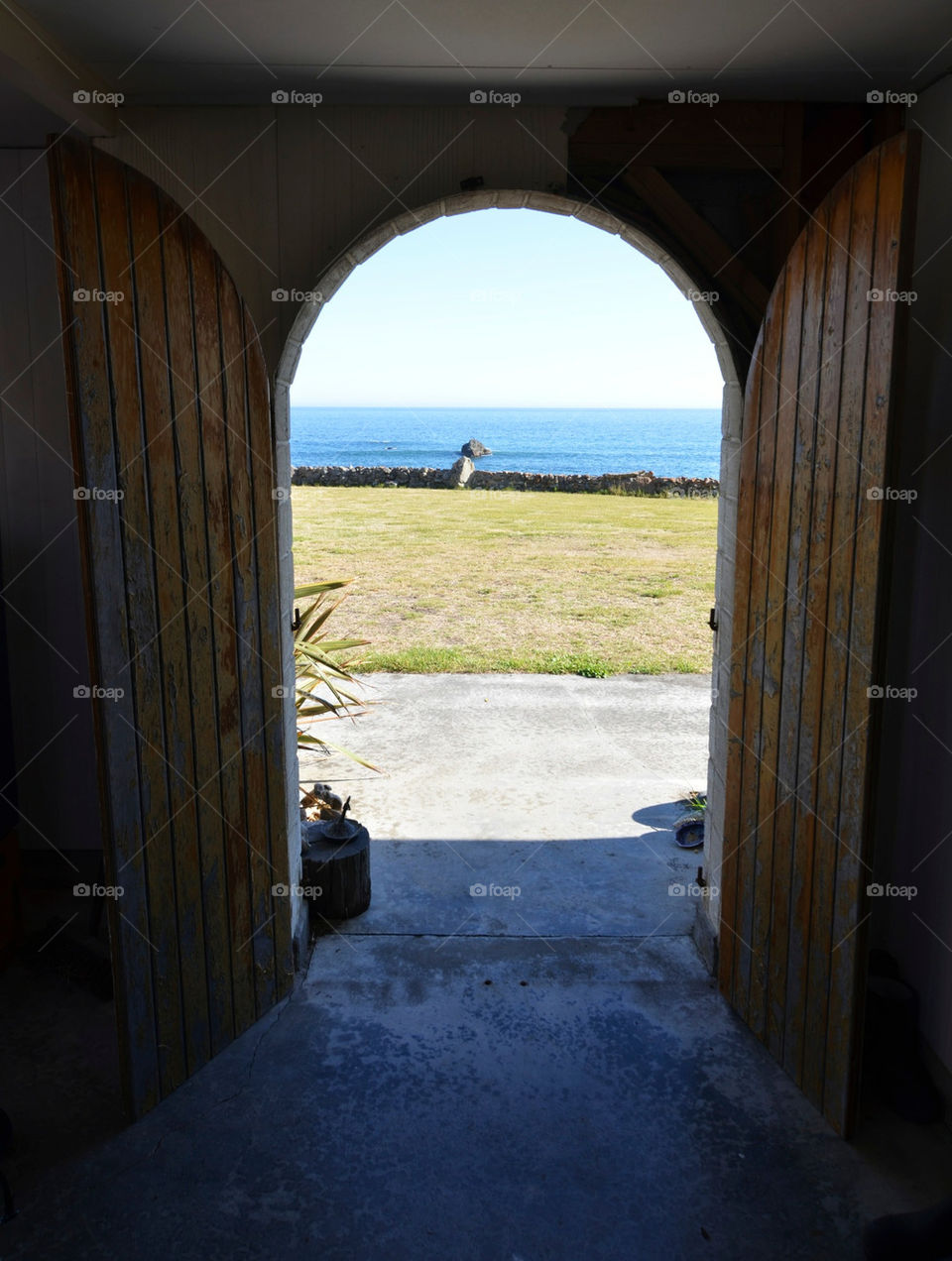 Open Wooden doors with outside view