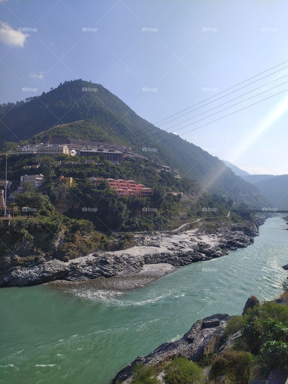 Confluence of Alaknanda and Bhagirath at Devprayagi to make the holy Ganga