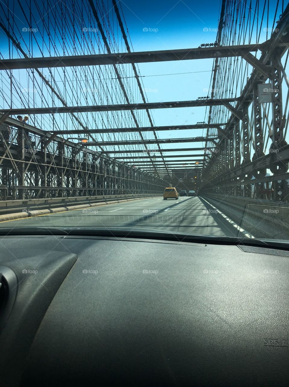 Image of the highway over the manhattan bridge in New York city captivates you with all the rectangular shapes. 
